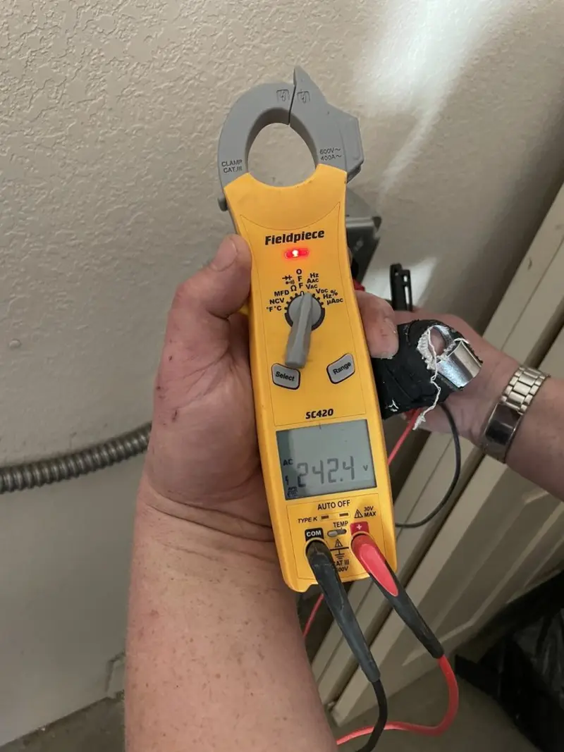 Voltage testing with clamp meter during Circuit Breaker Repair in Hickory
